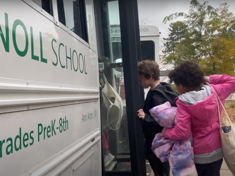 Students boarding SK's school bus